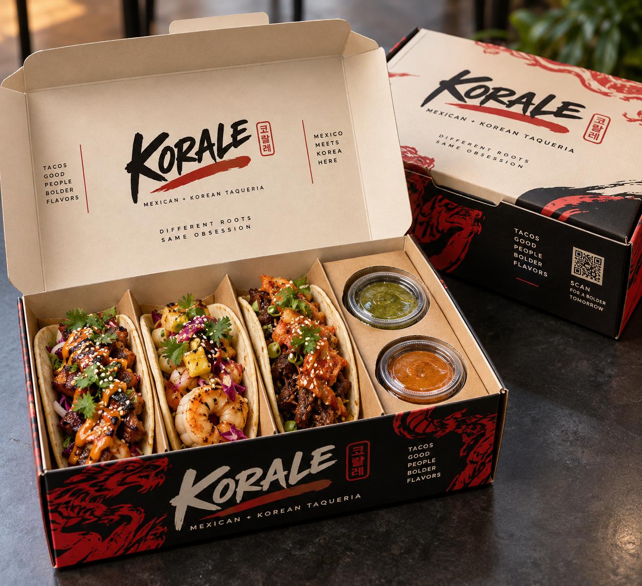 An open K-Órale box with three tacos and two sauces
